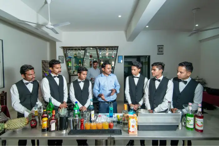 Students working in hotel kitchen